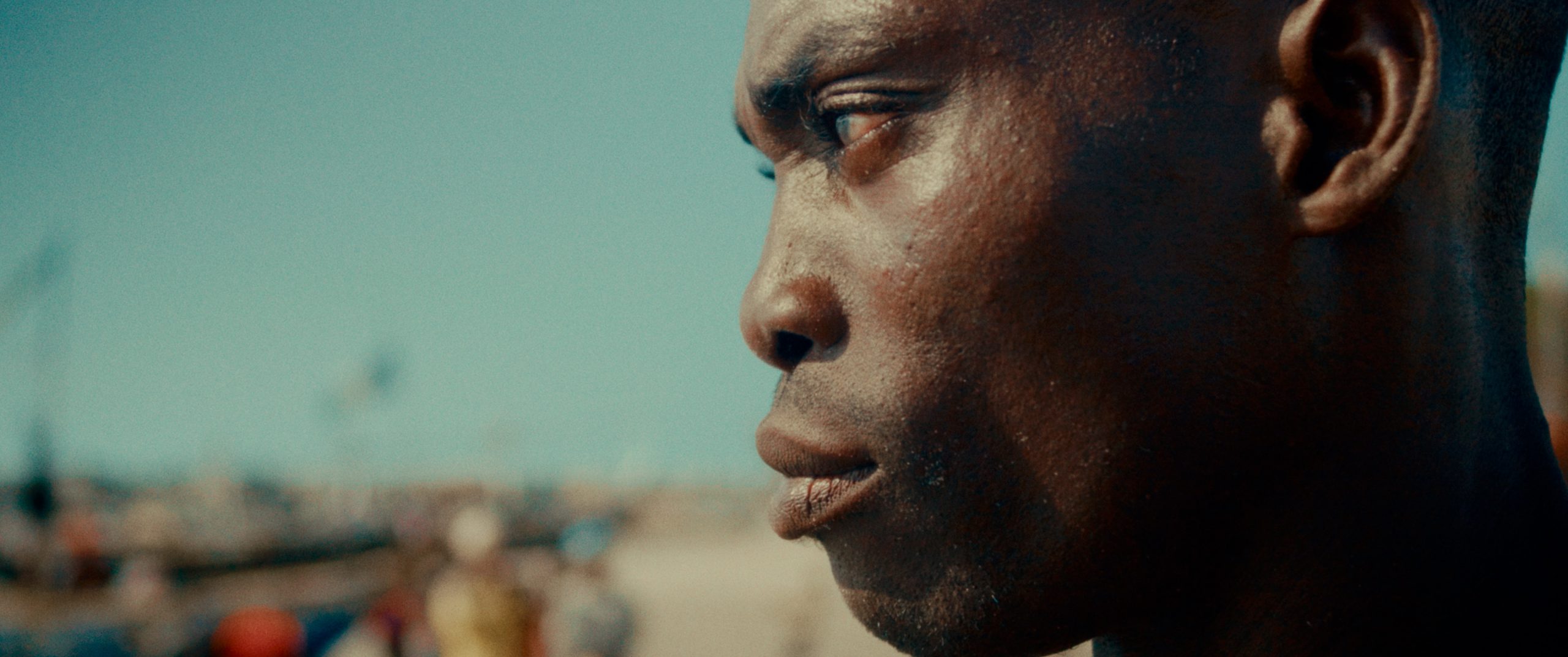 Color grading for African fishing village scene with warm and earthy tones