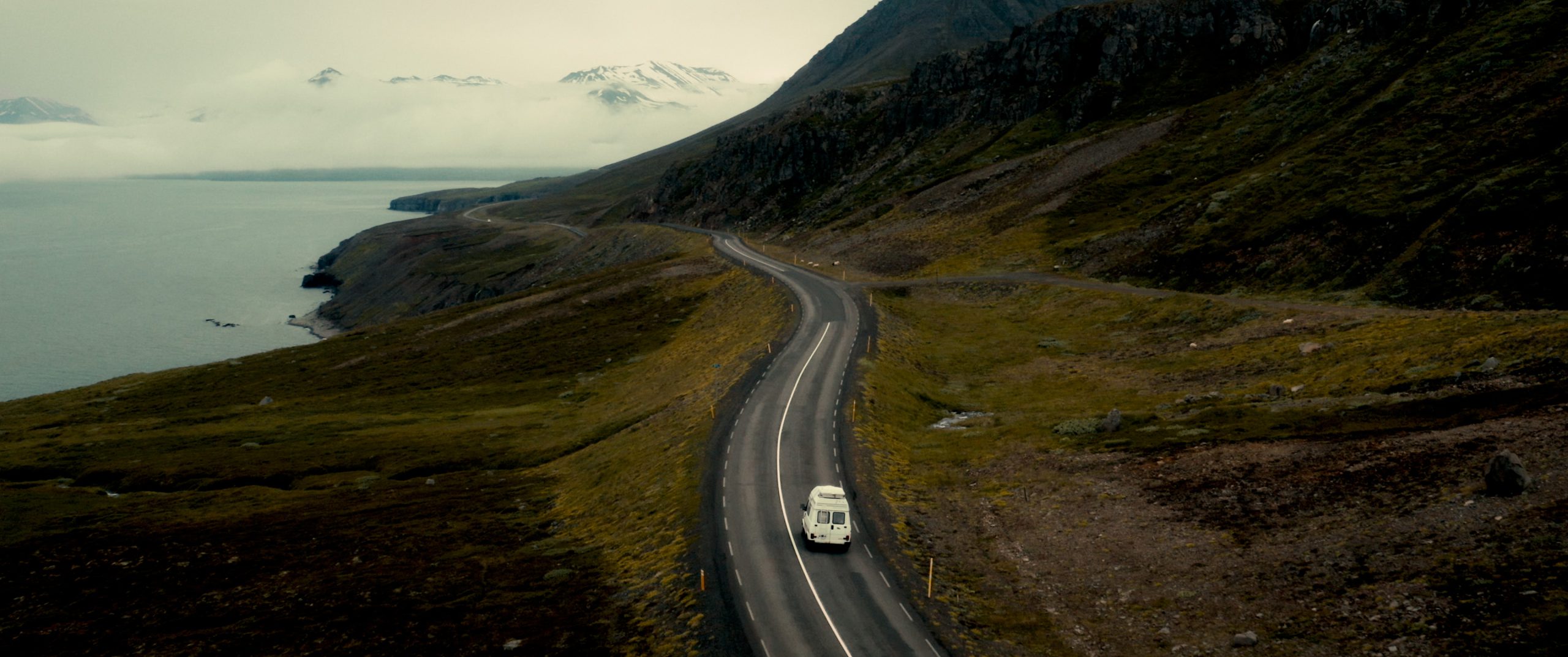 Color grading aerial drone shot of a road trip with cinematic tones